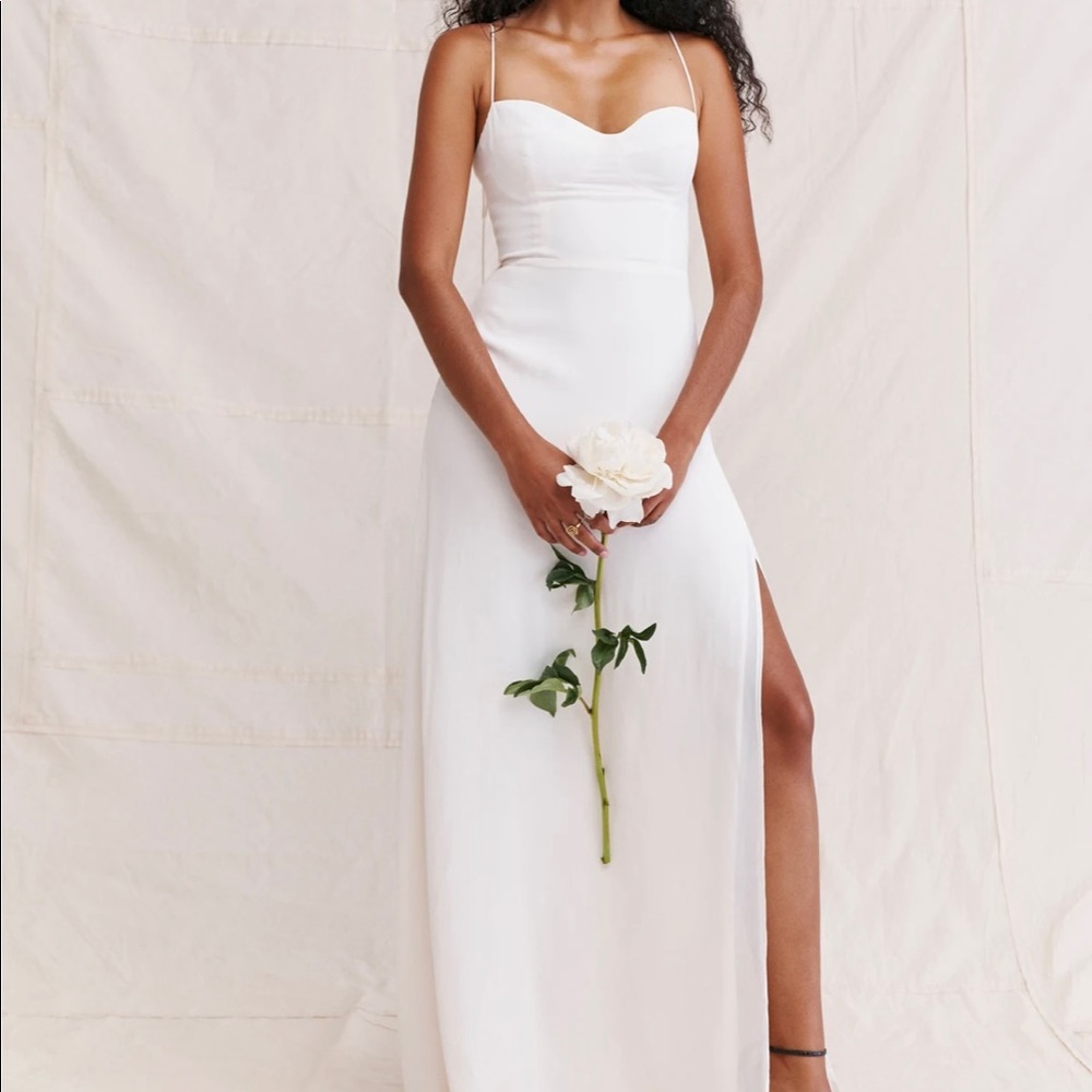 Brand new with tags. Never worn. Reformation white bridal dress. Melita size 6.
